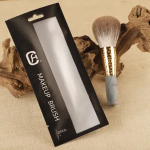 Large fluffy loose powder makeup brush with soft bristles and elegant handle design.