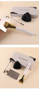 Professional flat foundation brush set with metal palette and puff for flawless makeup application.