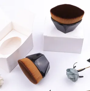No. 55 magic seamless foundation brush with petal diamond shape and dense soft bristles.