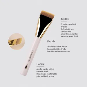Flat foundation brush with soft synthetic fibers for smooth, streak-free liquid makeup application.