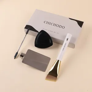 Professional makeup brush set with foundation spatula, brush and puff for flawless makeup.