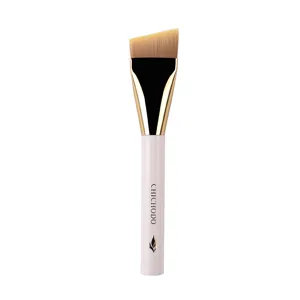 Slanted flat foundation brush for smooth makeup application, professional cosmetic tool.
