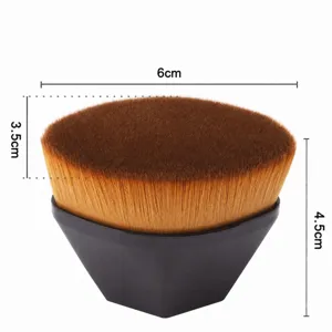 Magic foundation brush with dense brown bristles and ergonomic black diamond handle for makeup.