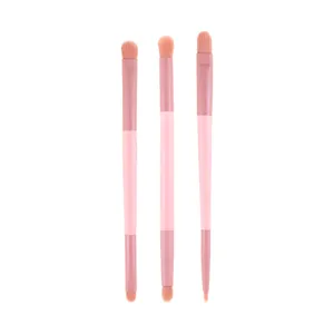Dual-ended makeup brushes set, pink blending and concealer brushes with soft fibers.