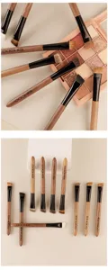 Custom walnut makeup brush set featuring angled eyebrow brushes and soft bristles for precise definition.