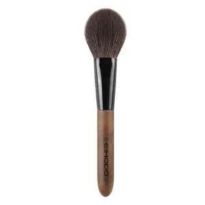 Professional soft hair powder makeup brush with wooden handle for flawless facial makeup application.