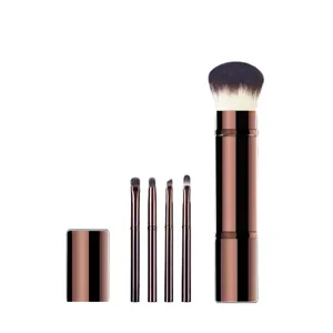 Portable mini retractable makeup brush set with dual ended powder and detail eyeshadow brushes.