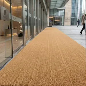 Detailed close-up showing the dense fibrous texture of a natural coir outdoor entrance mat