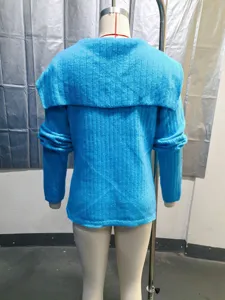 Detailed back view of a vibrant blue ribbed knit cardigan displayed on a mannequin.