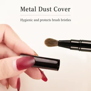 Portable double-headed telescopic makeup brush with metal cap for lip and eye contouring.