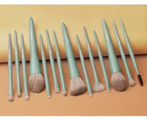 Set di 14 pennelli per trucco professionali con setole morbide e manici verde menta.