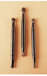 Dual-ended retractable makeup brush set for precise eye shadow application and seamless blending.