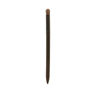 Professional wooden handle round eye blending brush for eyeshadow and nose shadow application.