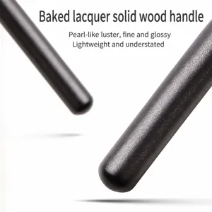 Professional wooden makeup brush handle with micro-shimmer paint finish for precision blending.