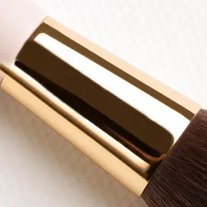 Professional makeup brush main image showing thick gold aluminum ferrule and soft bristles