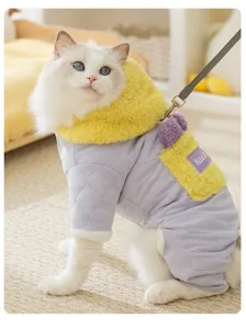 Detailed view of a warm quilted pet winter coat with yellow sherpa hood and cute pocket.