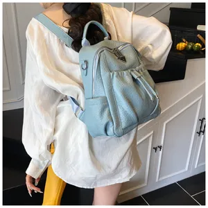Chic light blue leather women backpack for daily travel, casual outings, and stylish daily commuting.