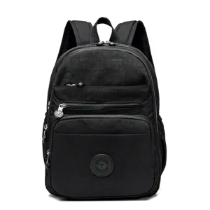 Black waterproof nylon casual travel backpack with multi-pocket design and top handle.