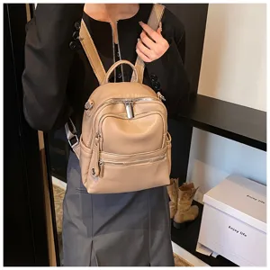 Casual women mini leather backpack detail shot, stylish beige daily school travel bag