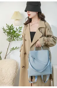 Detail view of stylish light blue women backpack, casual daily commuting design, elegant.