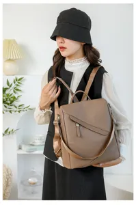 Stylish women's brown backpack with large capacity, perfect for daily commuting and casual use.