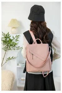 Minimalist pink women casual commuting backpack large capacity anti theft bag detail view.