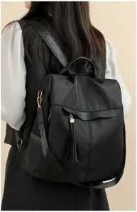 sac a dos casual en nylon noir pour femme voyage quotidien design leger anti-vol elegant
