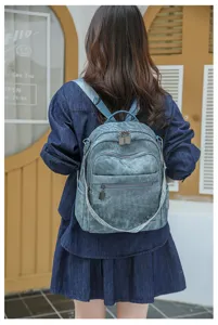 Stylish blue oxford cloth backpack for women, featuring multi-pocket design and casual daily use.