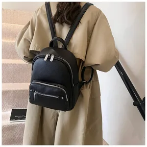 Stylish black PU leather backpack for women, casual daily use and travel daypack bag.