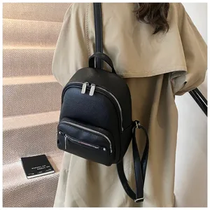 Detail view of stylish black soft leather backpack for daily use and travel style.