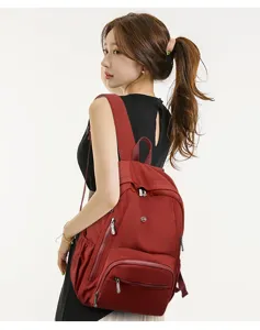 Zaino casual rosso minimalista per donna, grande capacità, perfetto per la scuola e viaggi.
