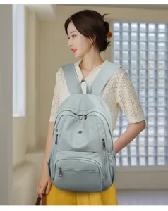 Zaino casual monocolore di grande capacità per studenti design minimalista dettagli.