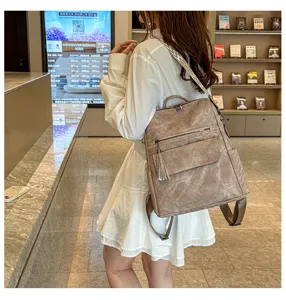 Stylish women soft leather vintage backpack with tassel detail for daily travel and fashion use.