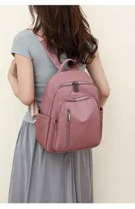 Stylish waterproof Oxford cloth women backpack with large capacity and multi pockets detail view.