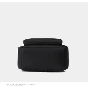 Detailed view of the black backpack bottom structure, showing durable daily use material.
