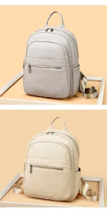 Sac à dos en cuir décontracté pour femme, sac de jour élégant avec poches zippées.