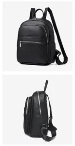 Vue détaillée de sac à dos en cuir noir montrant la poche avant et texture de profil.