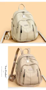 Women's fashion leather backpack with multiple zipper pockets and adjustable straps.