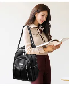 Stylish women black leather backpack for casual travel, fashion daily school daypack bag.