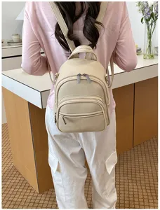 Casual beige leather backpack for women, stylish everyday commute minimalist daypack, detail view