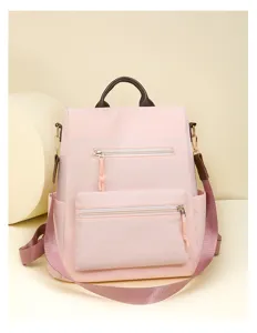Pink casual women backpack detail, multi-pocket stylish school bookbag with top handle.