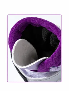 Close-up detail of dog winter snow boot interior with soft fleece and leather tongue design.