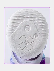 Non-slip wave sole dog snow boots detail view, warm fleece winter pet shoes close-up.