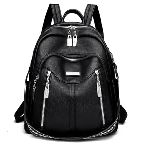 Stylish black leather backpack for women, multi-pocket casual travel daypack with silver hardware.