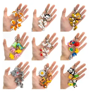 Cute 3D cartoon animal keychain set, soft rubber pendants for bags and car keys.