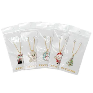 Kerst strass legering sleutelhanger hanger set met schattige vakantieornamenten en kralen.