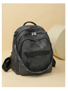 Sac à dos femme en cuir souple gris foncé, détail vintage décontracté pour voyage et école.