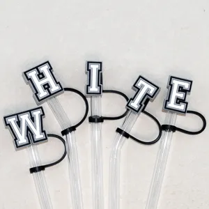 Silicone straw covers with letter charms, clear reusable drinking straws detail view.