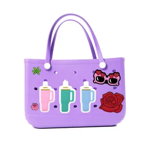 Purple EVA beach bag featuring adorable DIY charms including cute tumbler and sunglasses.