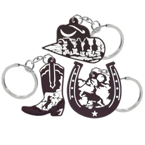 Westerse cowboy sleutelhanger set met hoed laars en hoefijzer gemaakt van duurzaam PVC materiaal.